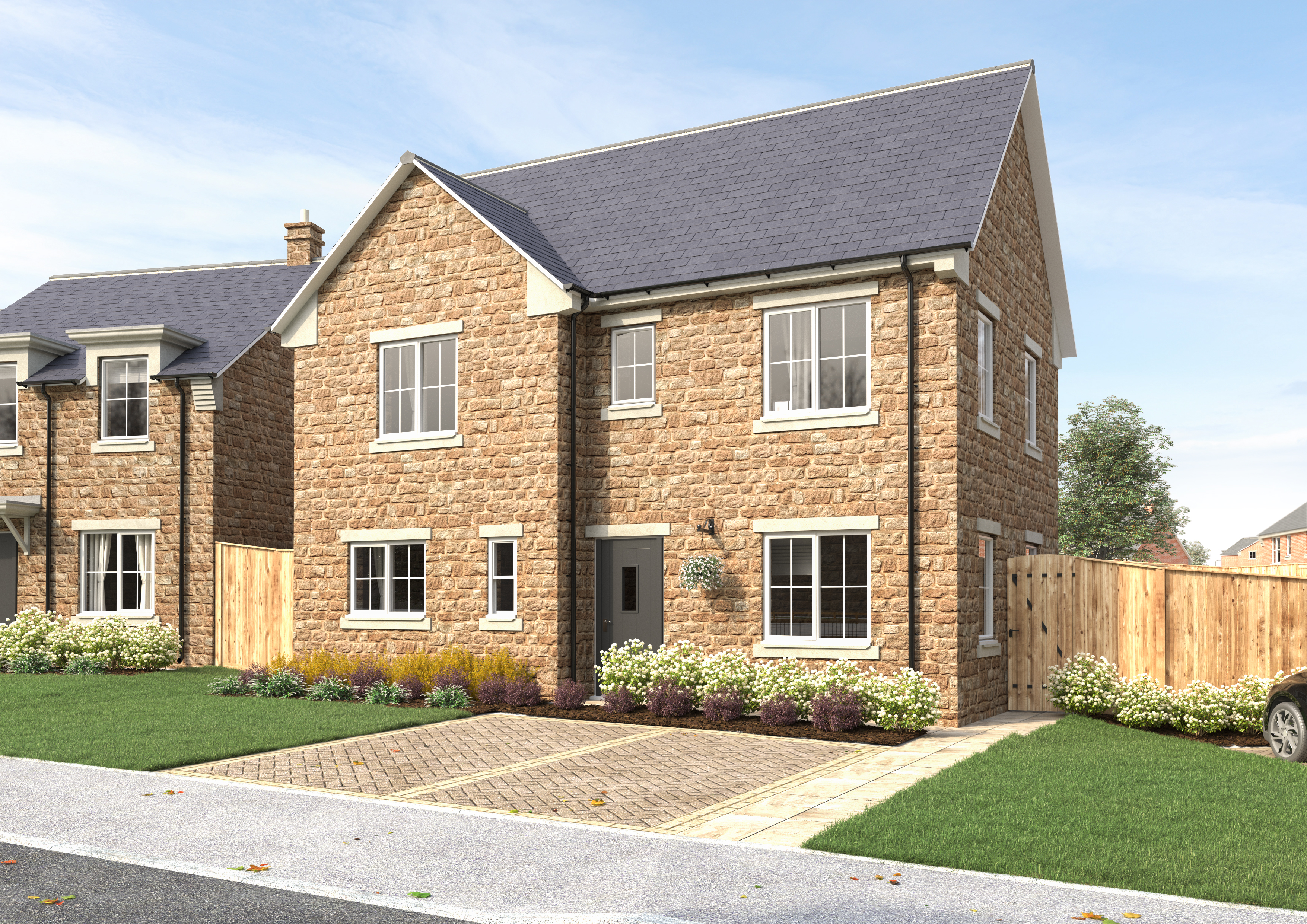 A traditional brown bricked two story home with a large paved driveway and fenced garden